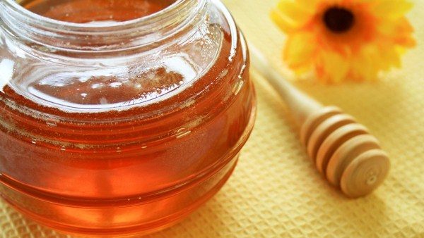  Dulătura de miere într-un borcan de sticlă