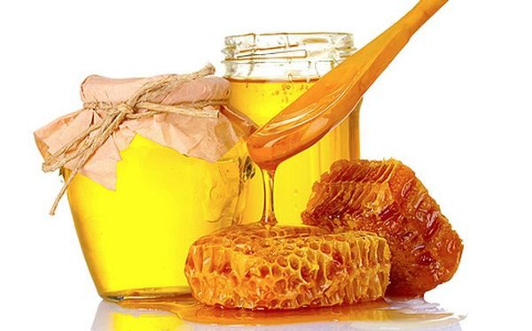  Miere în borcane de sticlă și faguri de miere